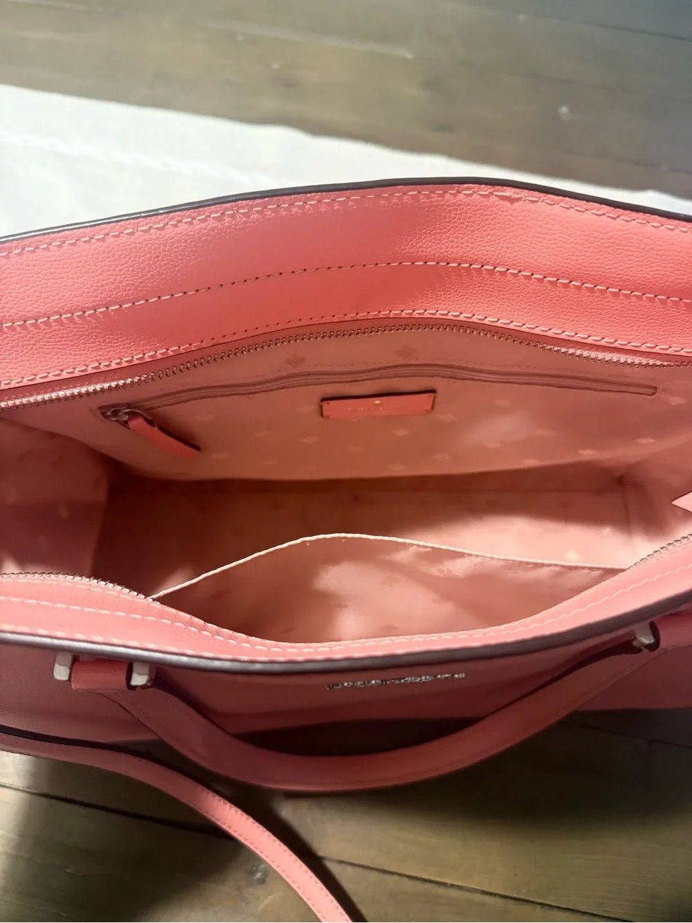 Kate Spade shoulder bag with crossbody strap.